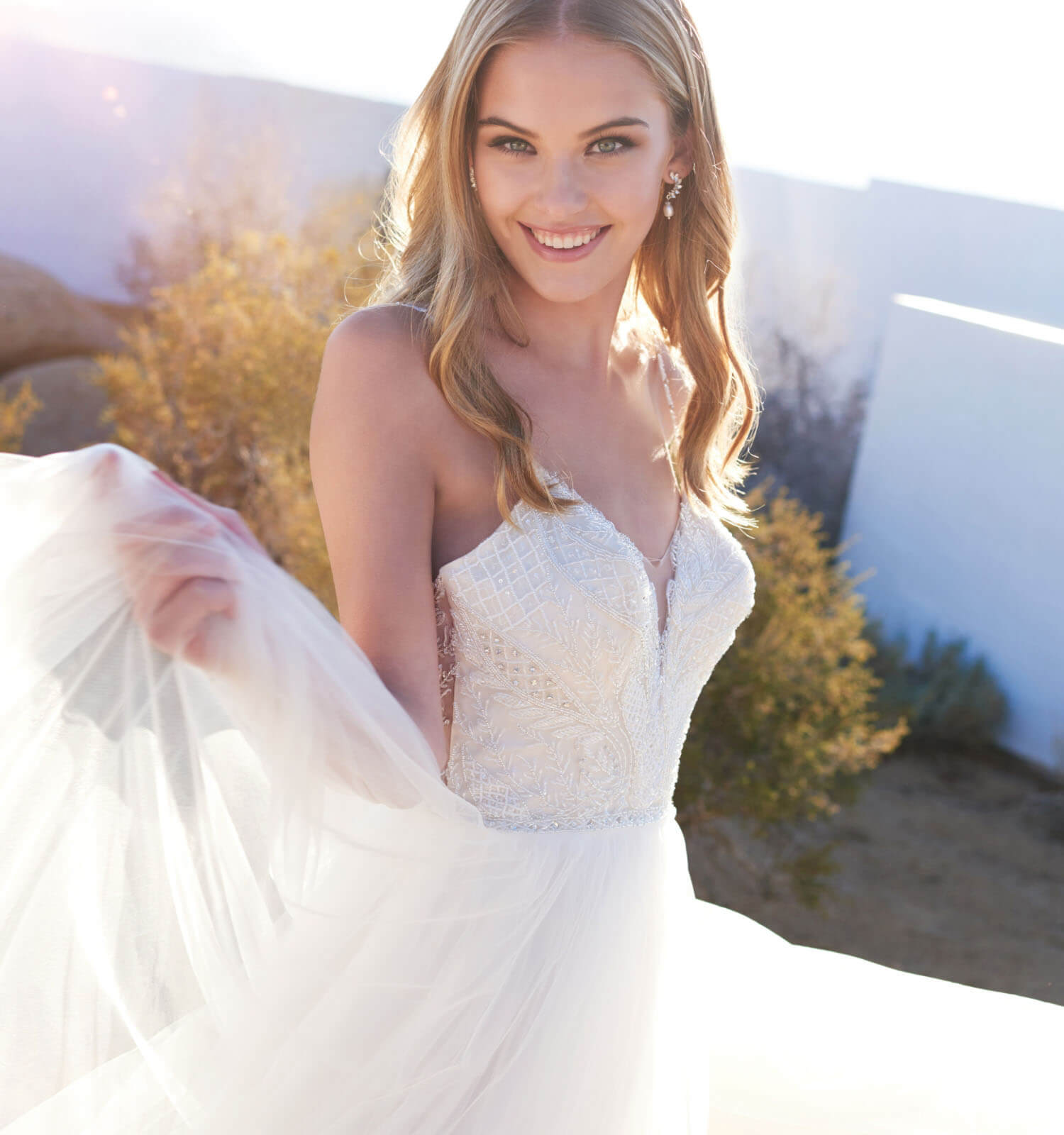 Blonde bride in white wedding dress. Mobile Image